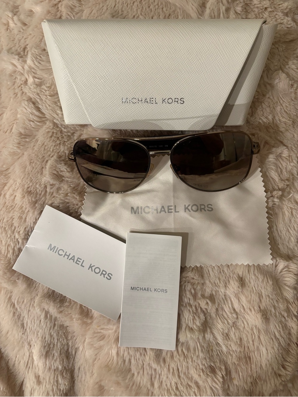 Michael Kors Aviator Sunglasses in gold with Brown Gradient Lenses